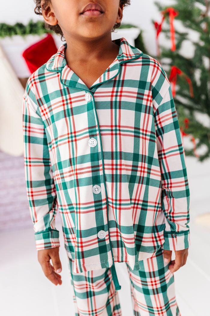 A close-up detail shot of a red, green, and cream plaid - a classic Christmas staple print for the holiday season
