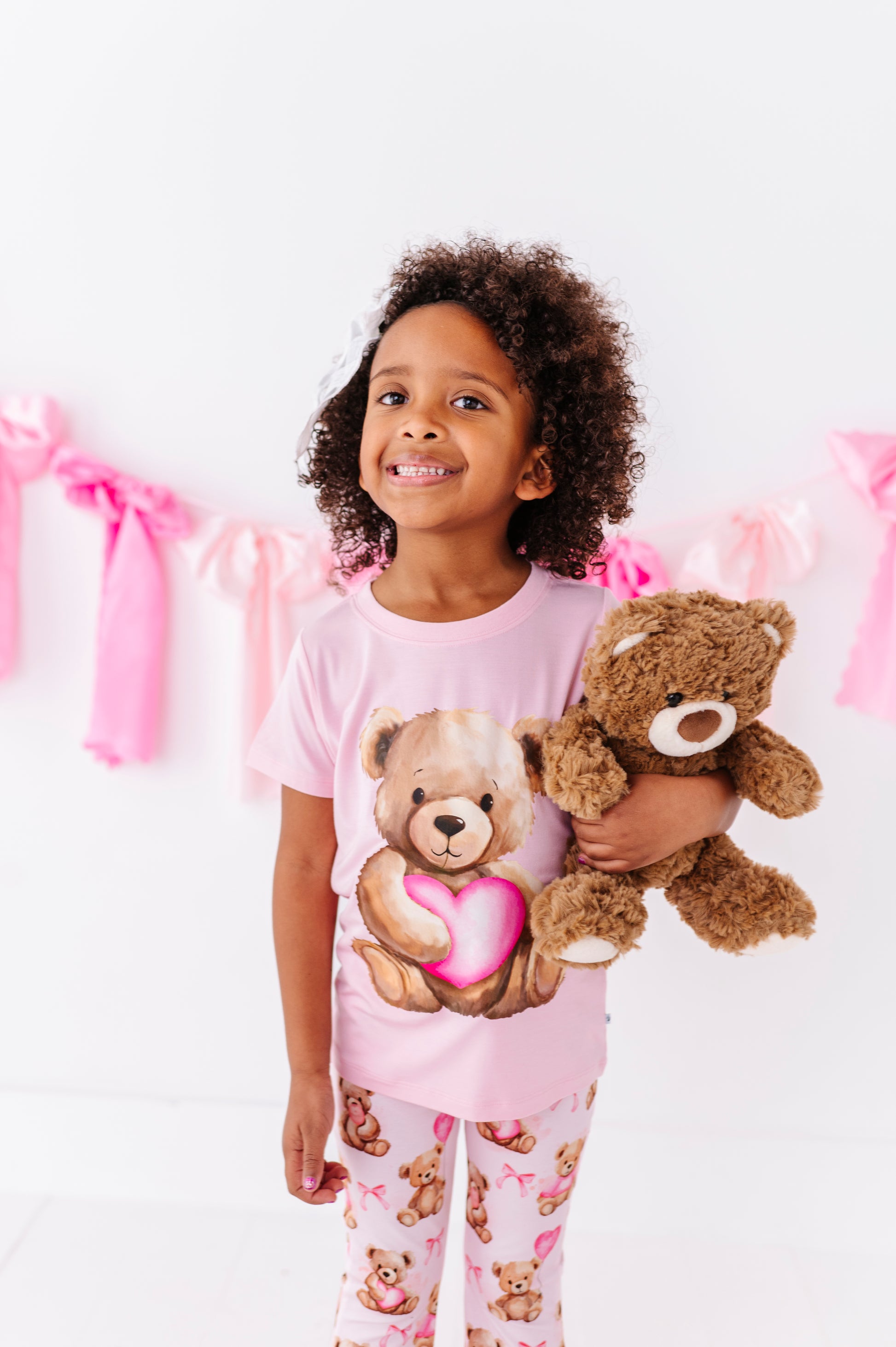 Child modeling pink Beary Sweet graphic t-shirt made from bamboo viscose