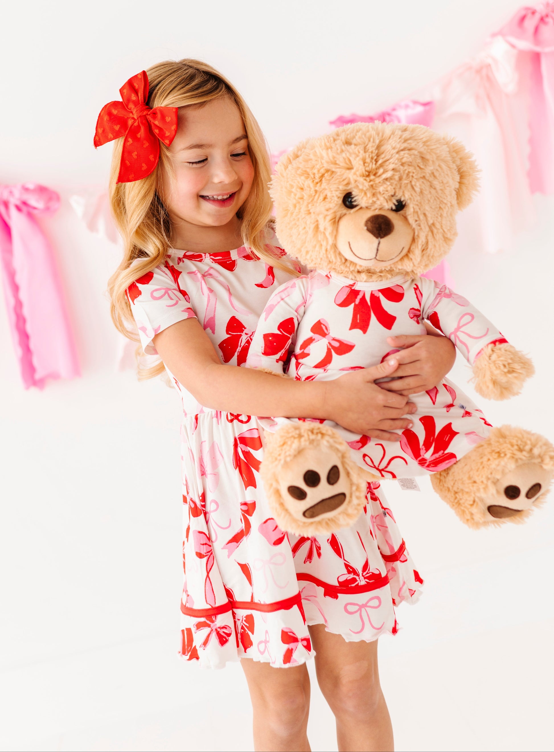 Girls bamboo viscose dress with red ribbon trim and bow print