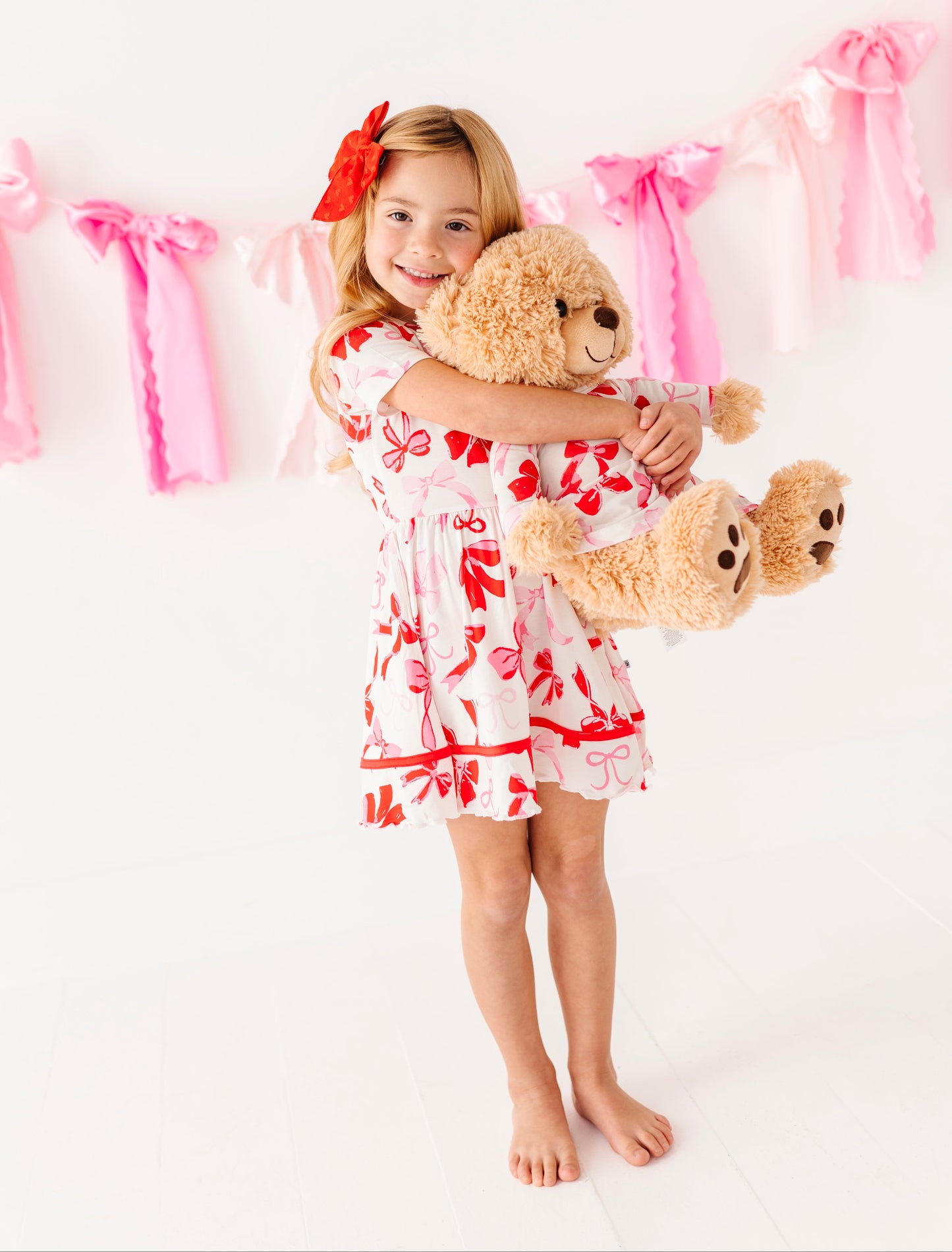 Girls bamboo viscose dress with red ribbon trim and bow print