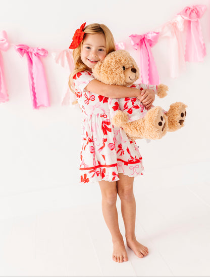 Girls bamboo viscose dress with red ribbon trim and bow print