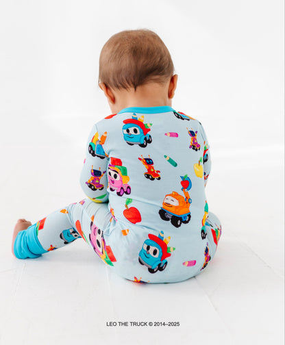 Baby boy wearing a light blue Leo the Truck and crew bamboo convertible romper on a white background