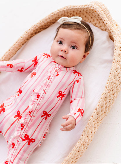 Ruby Ribbons ruffle convertible romper showing soft bamboo fabric and stripe pattern