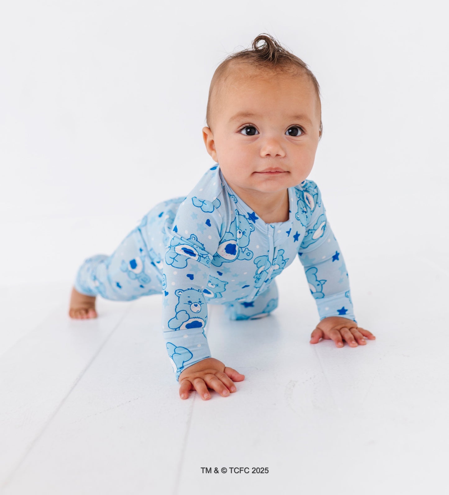 Grumpy Bear bamboo romper with fold-over feet cuffs and two-way zipper