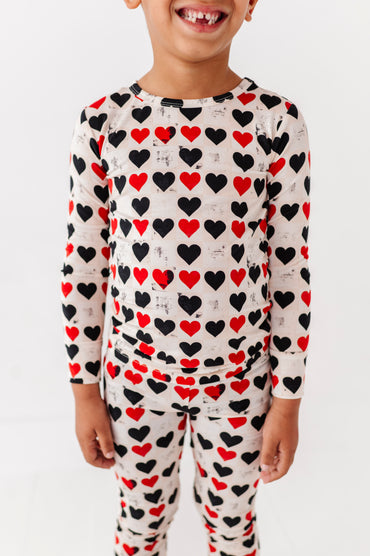 Close-up of King of Hearts bamboo pajamas showing ribbed fabric and heart pattern