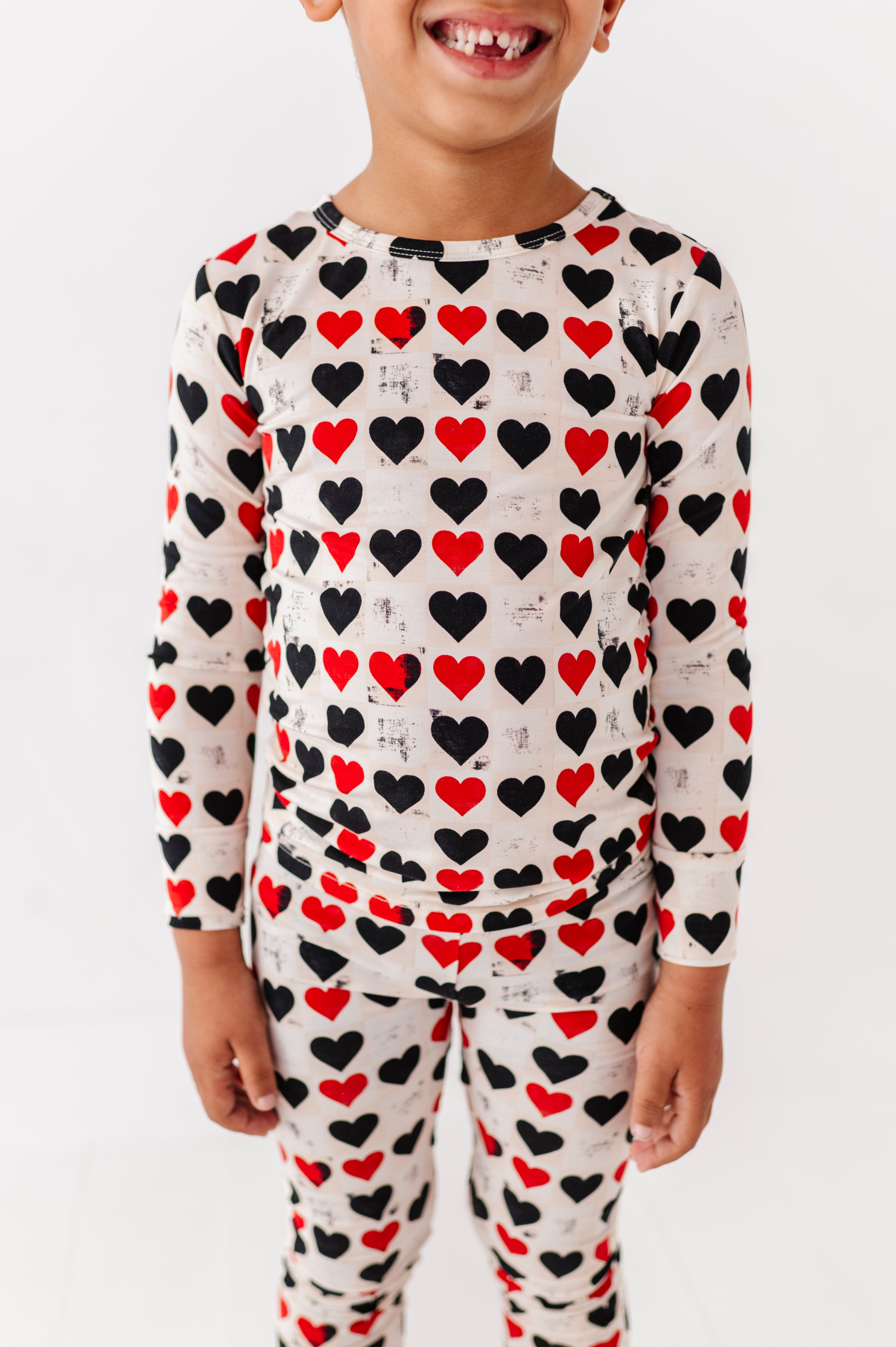 Close-up of King of Hearts bamboo pajamas showing ribbed fabric and heart pattern