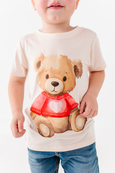 Close-up of teddy bear heart graphic on kids bamboo t-shirt