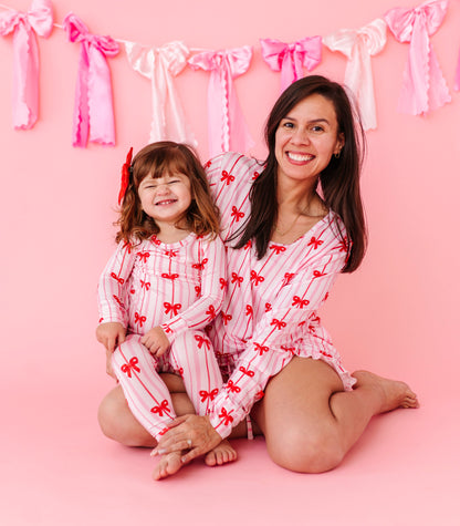 Matching mama and mini bamboo pajamas featuring Ruby Ribbons bow print