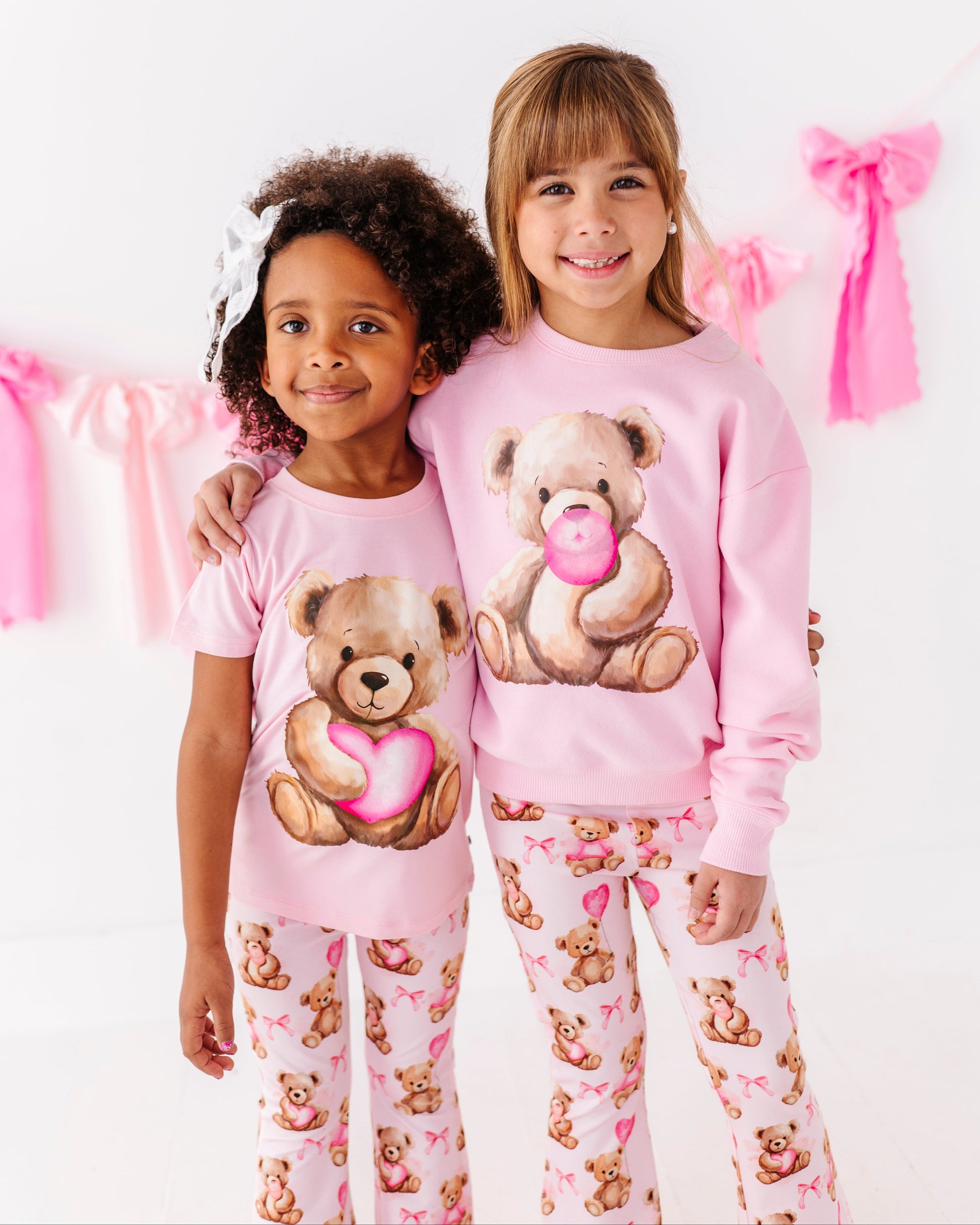 Valentine-inspired pink crewneck sweatshirt with teddy bear design