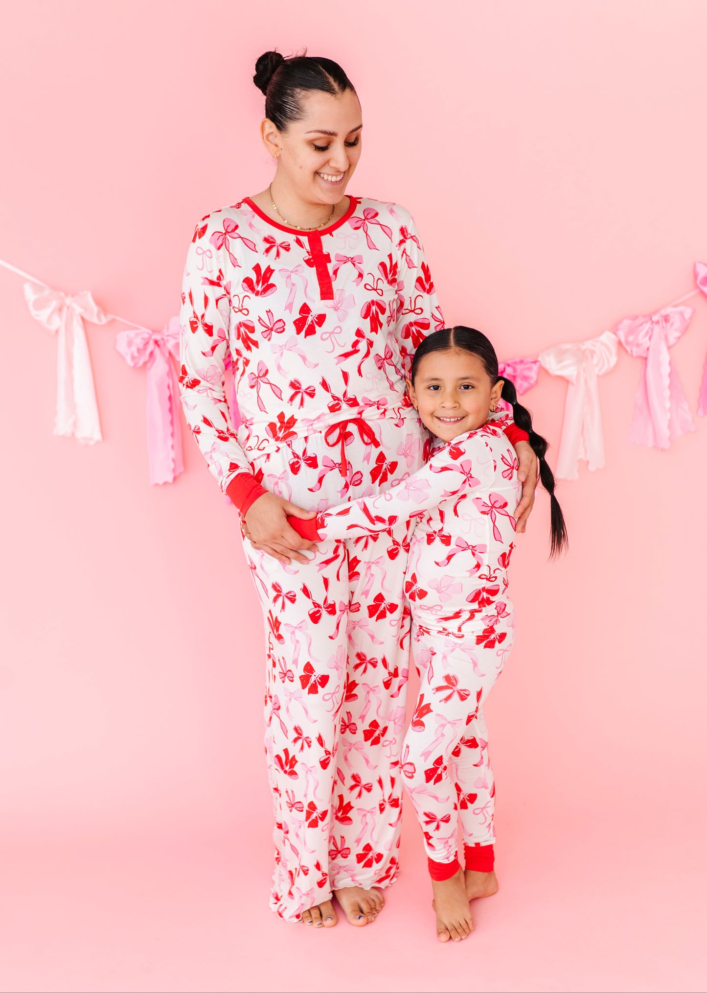 Mama and mini matching in Birdie Bean Blushing Bows bamboo pajamas