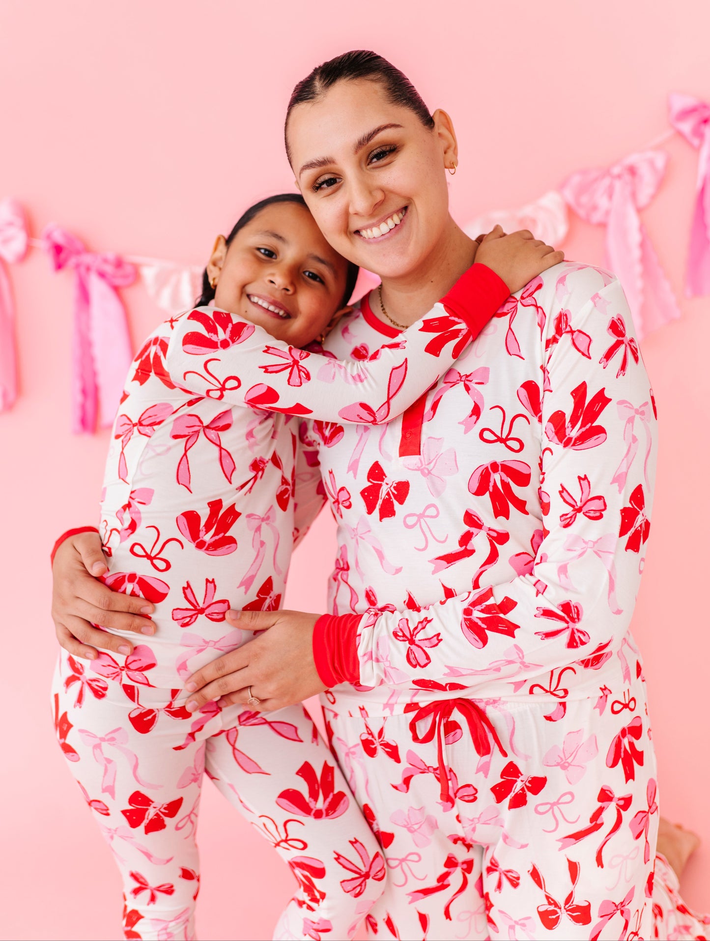Matching mommy and mini bamboo pajamas in Blushing Bows print