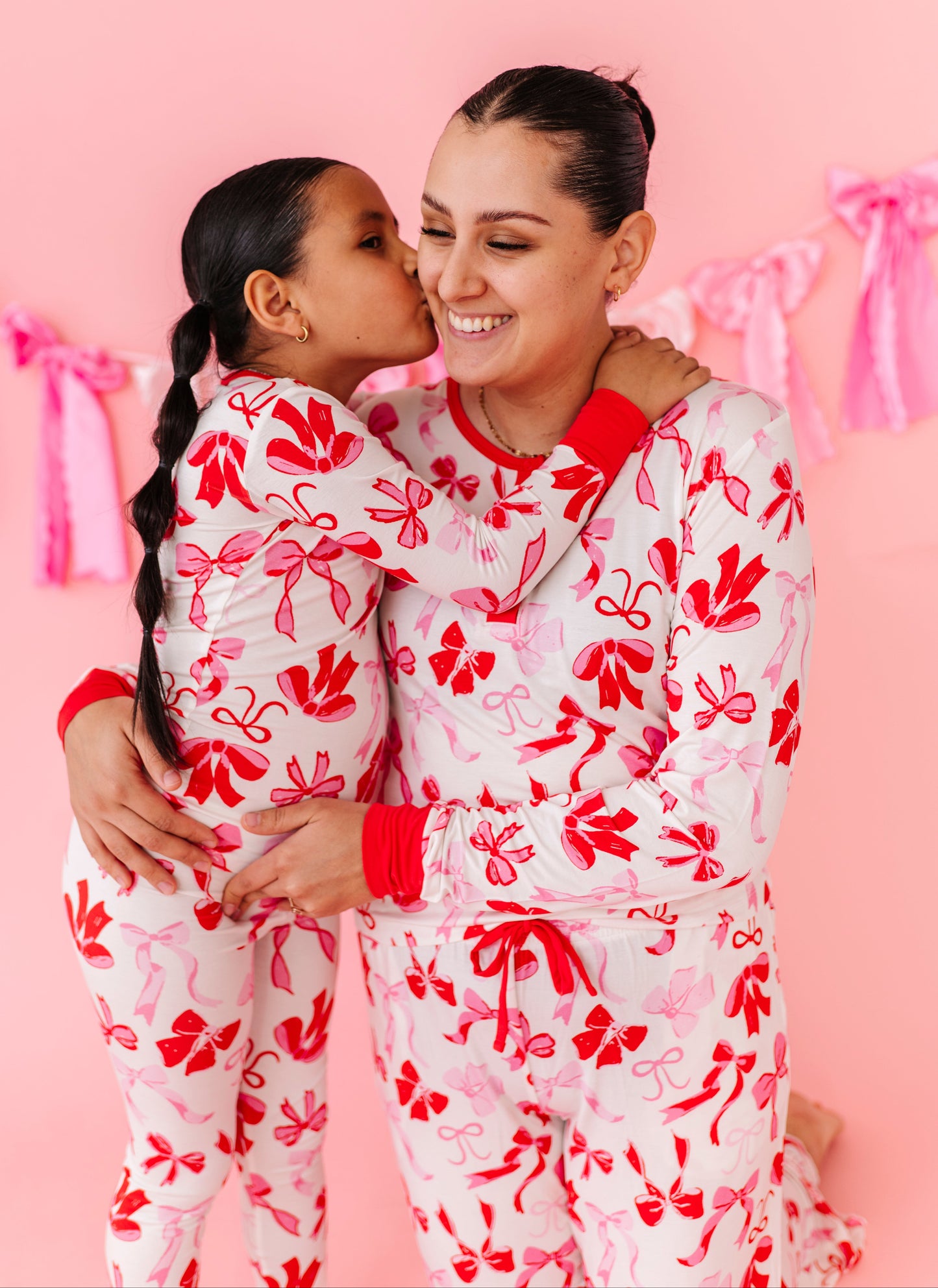 Matching mommy and mini bamboo pajamas in Blushing Bows print