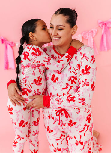 Matching mommy and mini bamboo pajamas in Blushing Bows print