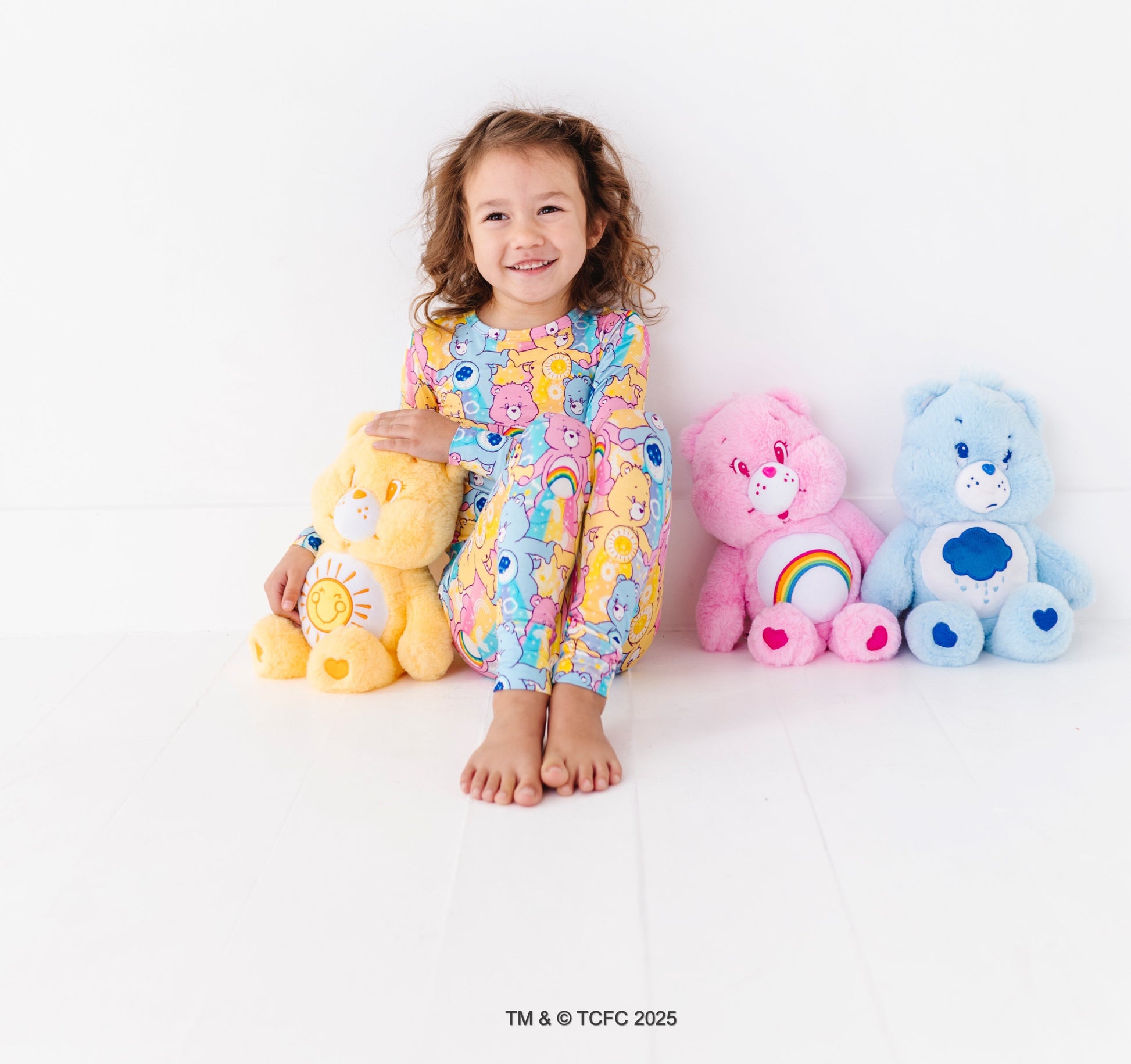 Front view of Care Bears™ Stare pajama set showing cheerful character pattern and bright colors