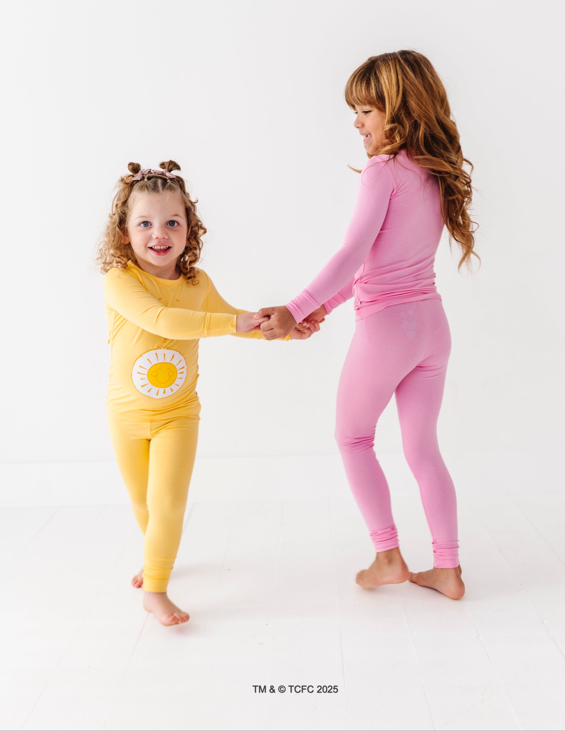 Care Bears Funshine Bear pajamas with bright yellow color and playful design
