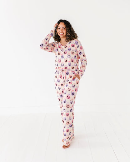 Woman wearing a Halloween bamboo pajama set on a white background