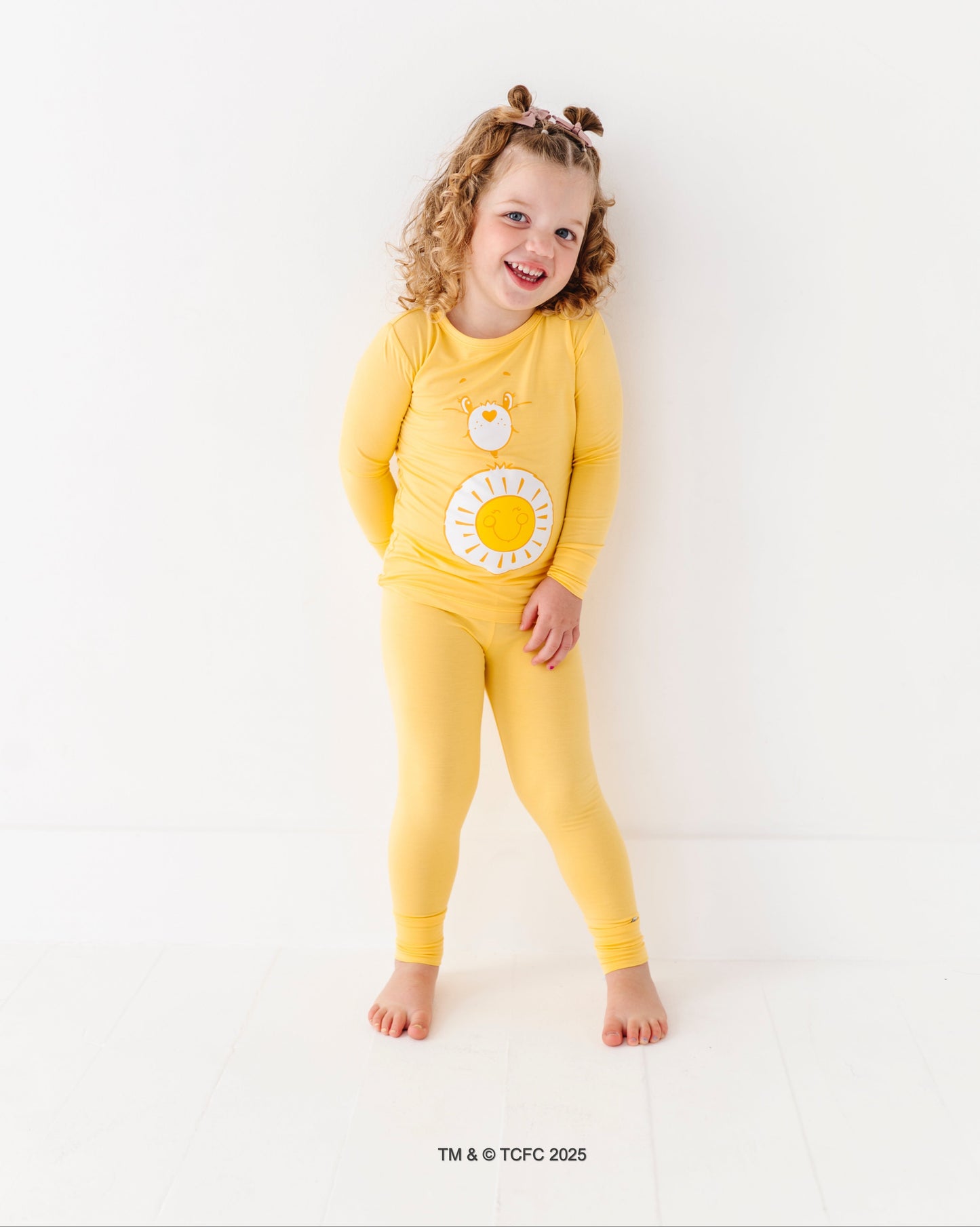 Two-piece Care Bears Funshine Bear pajama set made from soft bamboo fabric