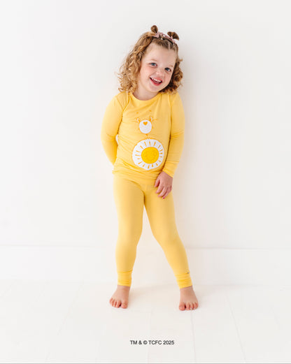 Two-piece Care Bears Funshine Bear pajama set made from soft bamboo fabric