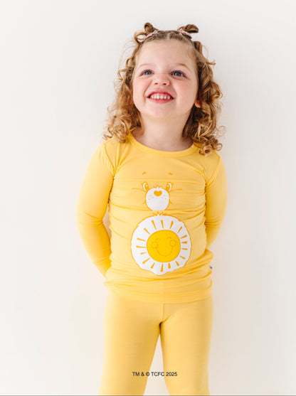 Kids Care Bears bamboo pajamas featuring Funshine Bear and iconic sun badge