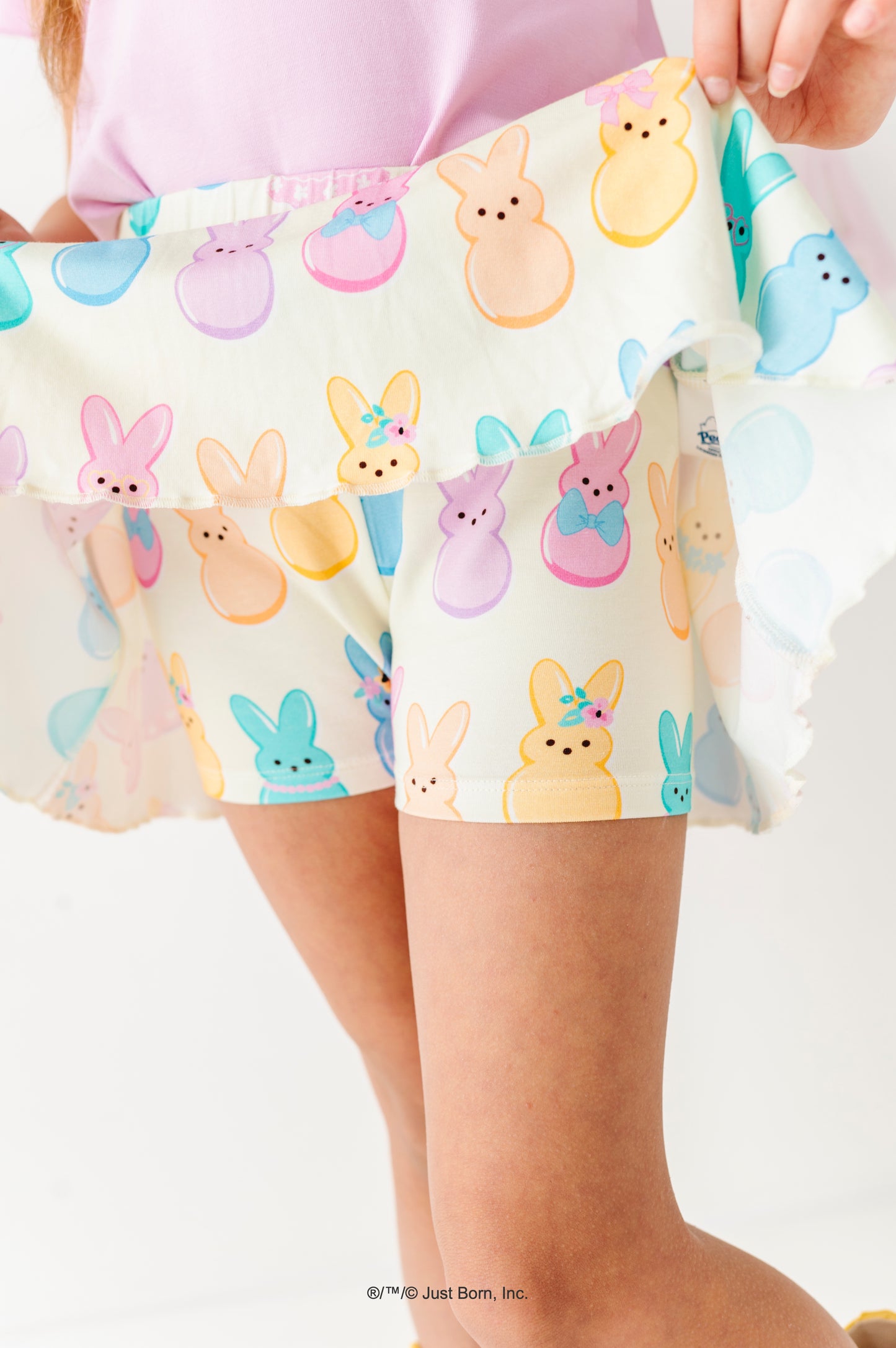 Skirt with colorful PEEPS® bunny pattern held by a person