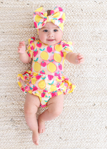Summer baby headwrap worn by infant for warm weather styling