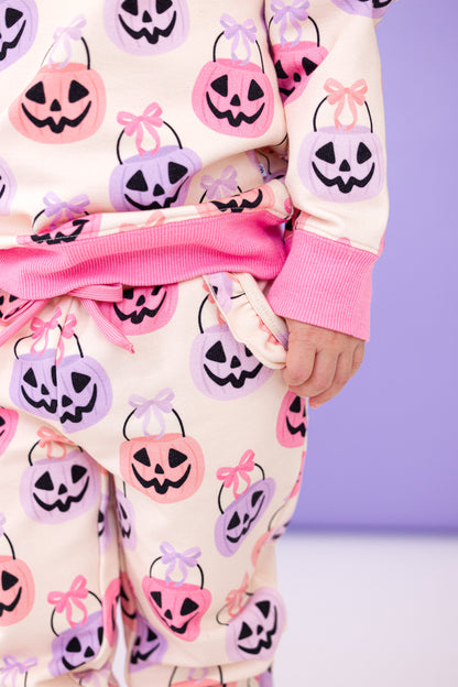 Children's bamboo outfit with Halloween-themed design on a light purple background