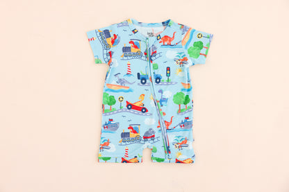 Children's bamboo romper with vehicle and animal pattern on a beige background
