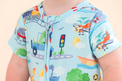 Children's bamboo outfit with colorful transportation-themed design on a plain background