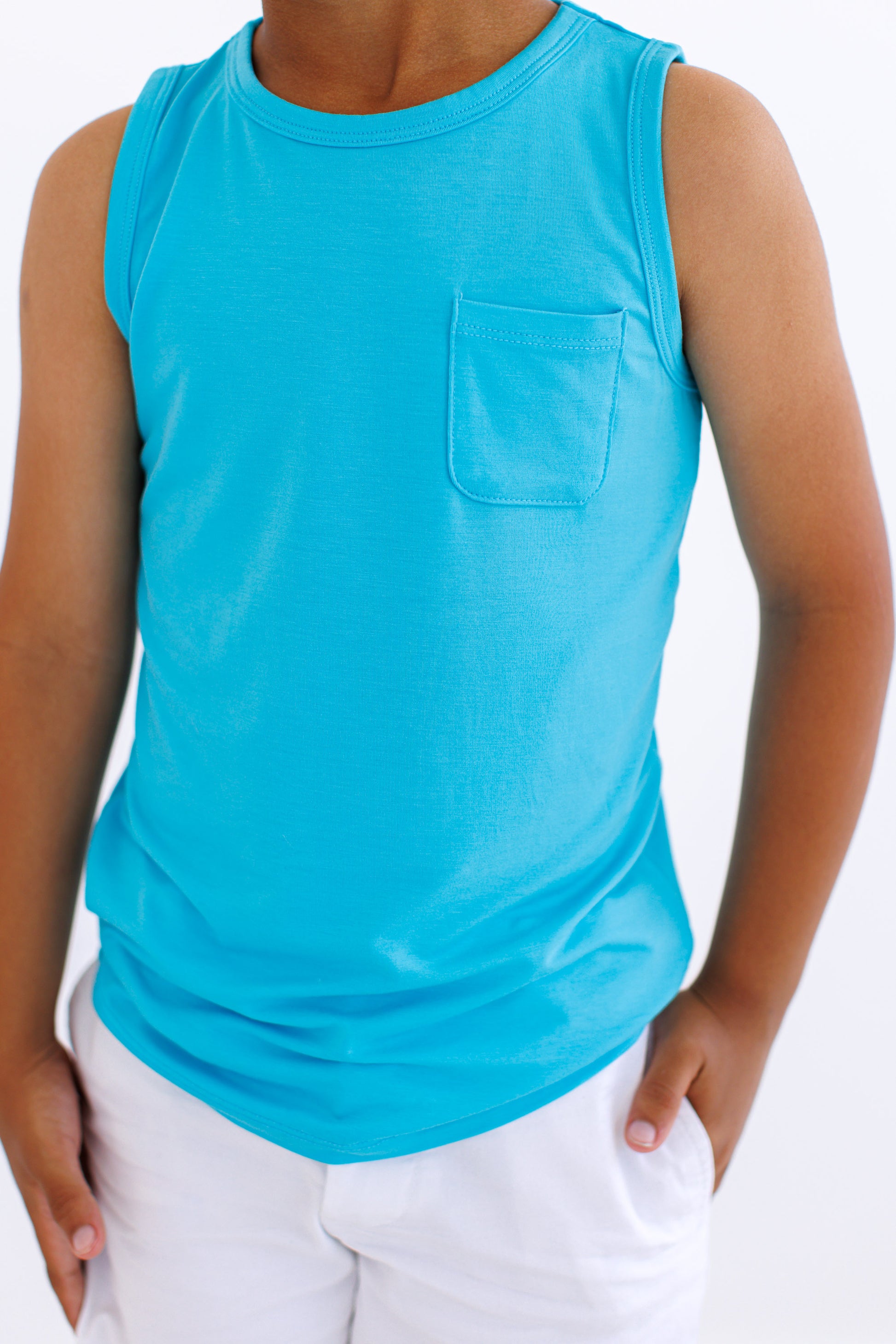 Toddler wearing a Scuba Pocket Tank with chest pocket and sleeveless fit