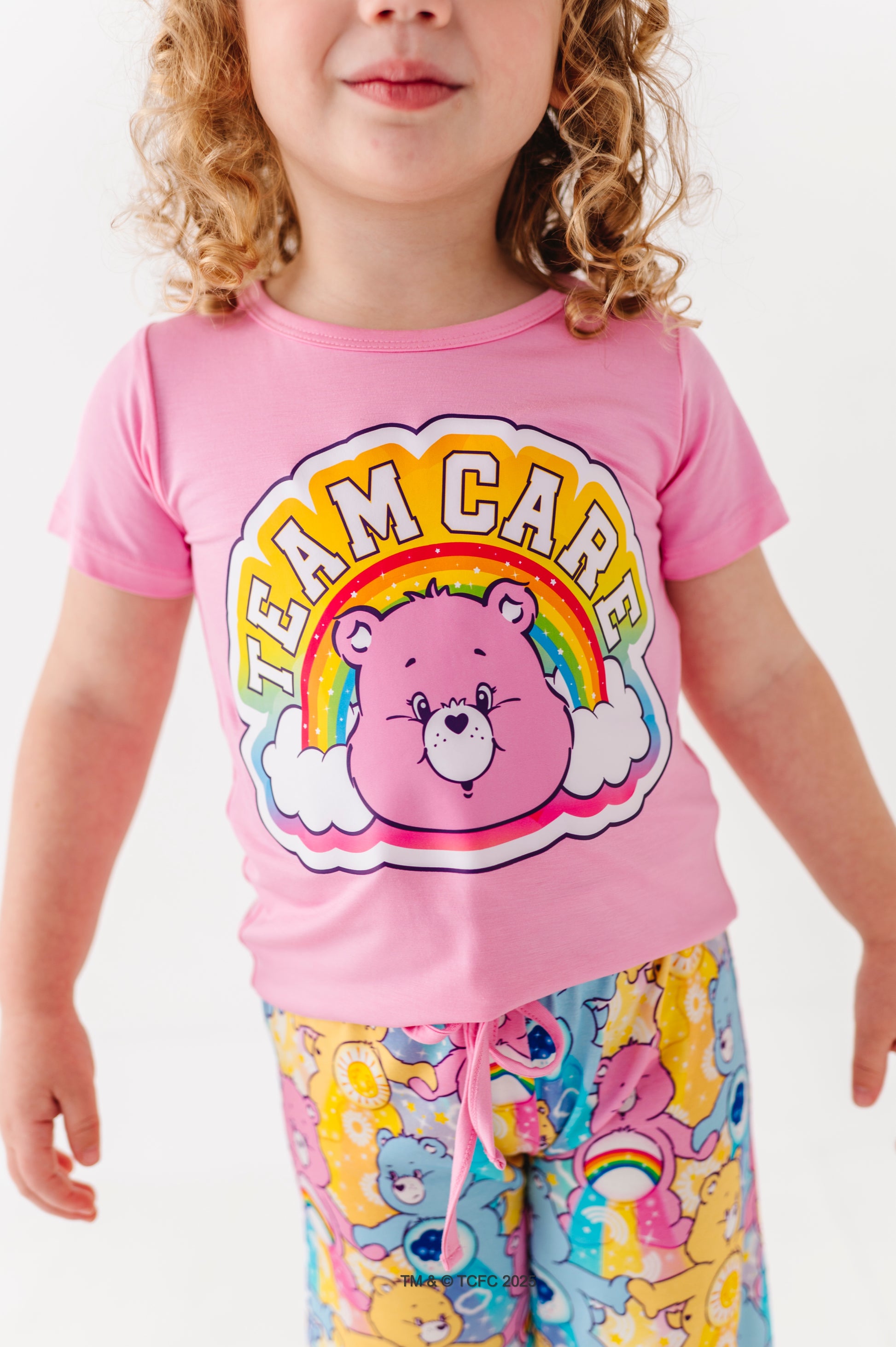 Close-up of Care Bears™ Stare pink Team Care tee