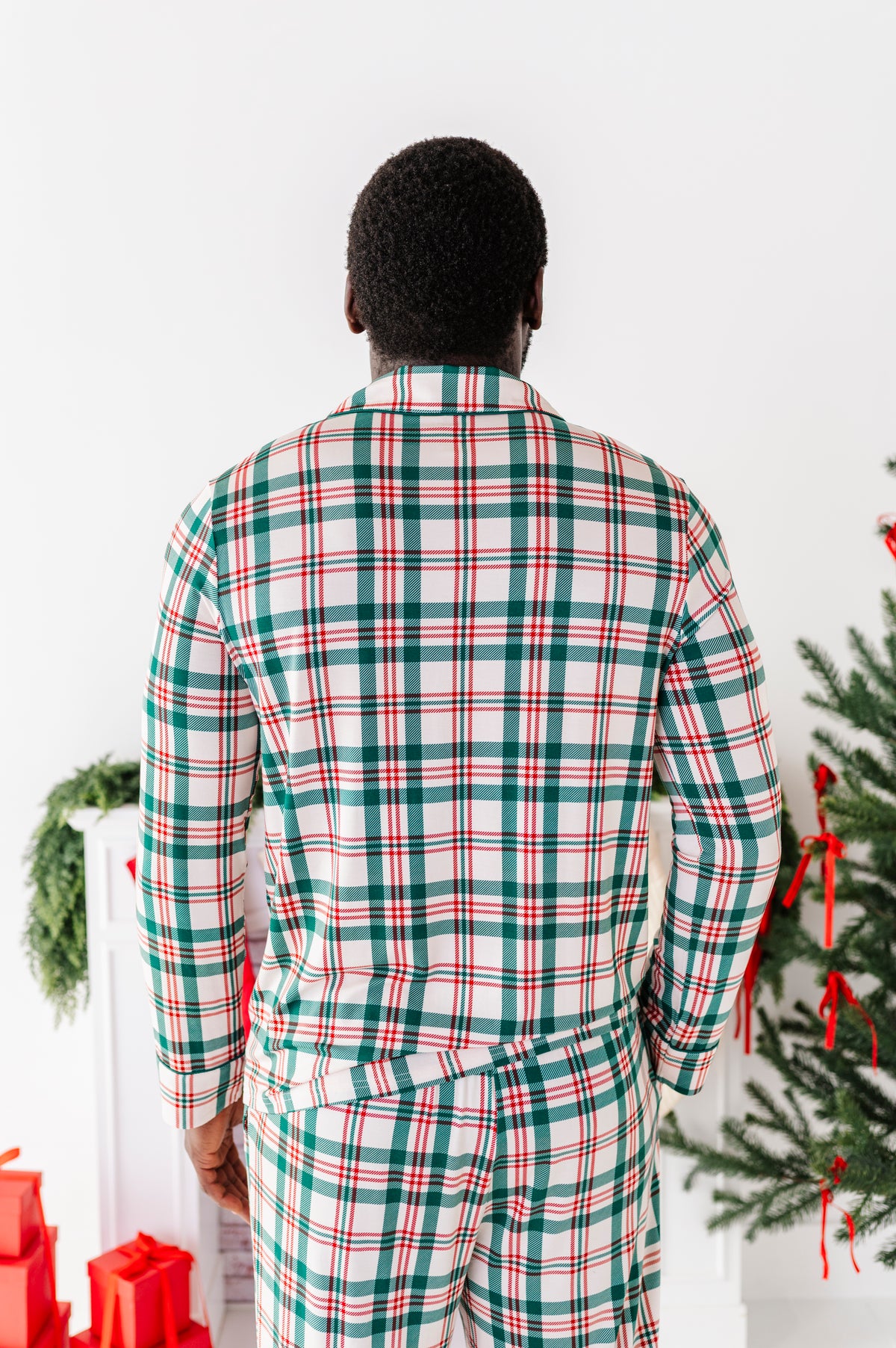 The back view of a bamboo pajama set featuring a classic Christmas plaid print 