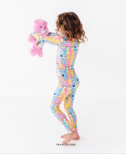 Side view of toddler in Care Bears™ Stare long sleeve bamboo pajamas with stretchy, snug fit