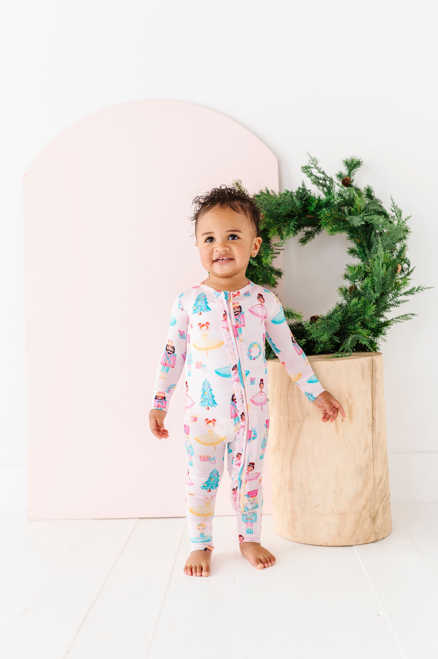 Bamboo baby romper with ruffle details and 2-way zipper
