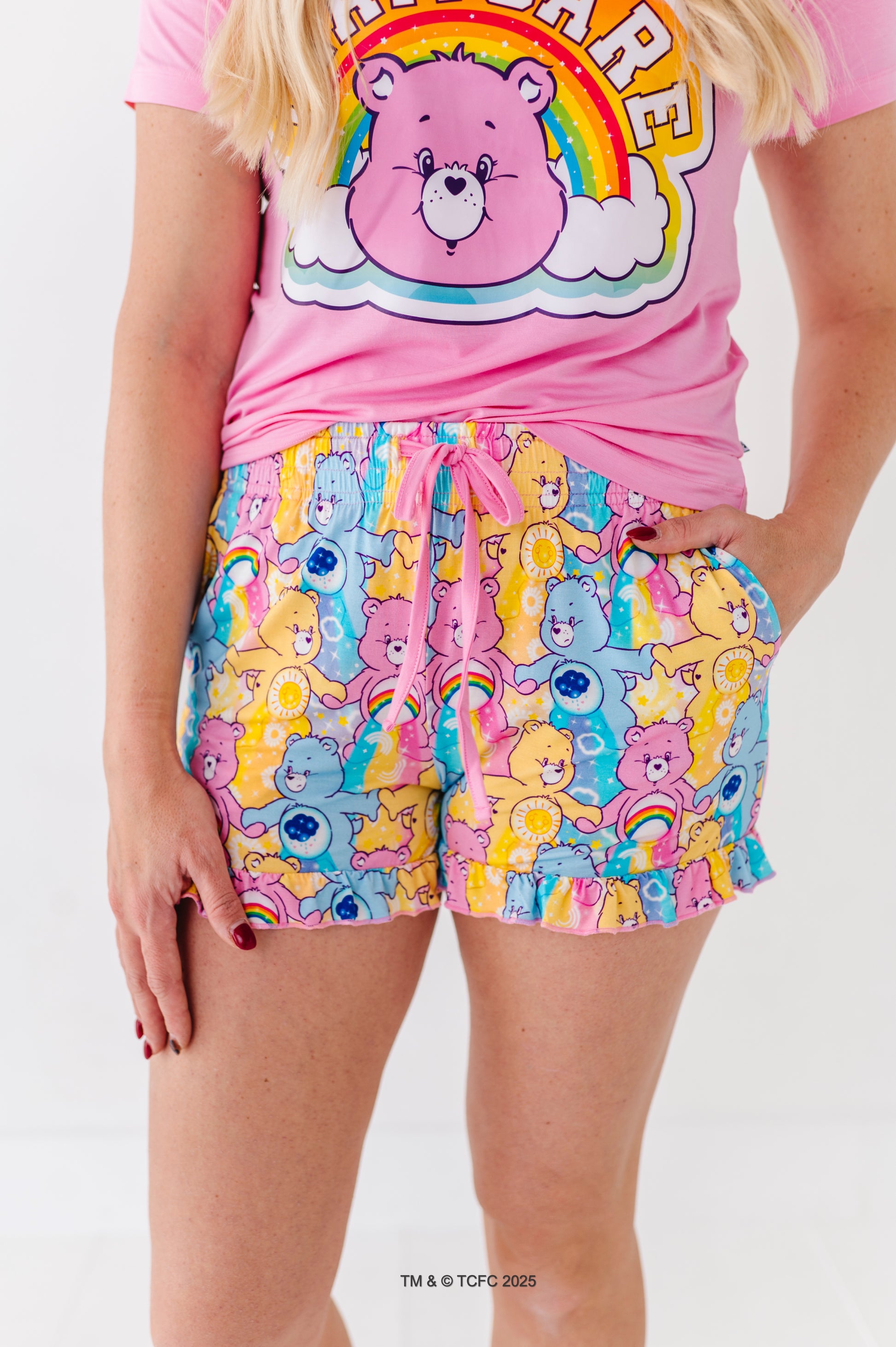 Close-up of women’s Care Bears bamboo pajama shorts featuring colorful allover bear print