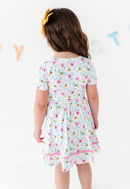 Child wearing a bamboo PEEPS® Easter dress with a white background