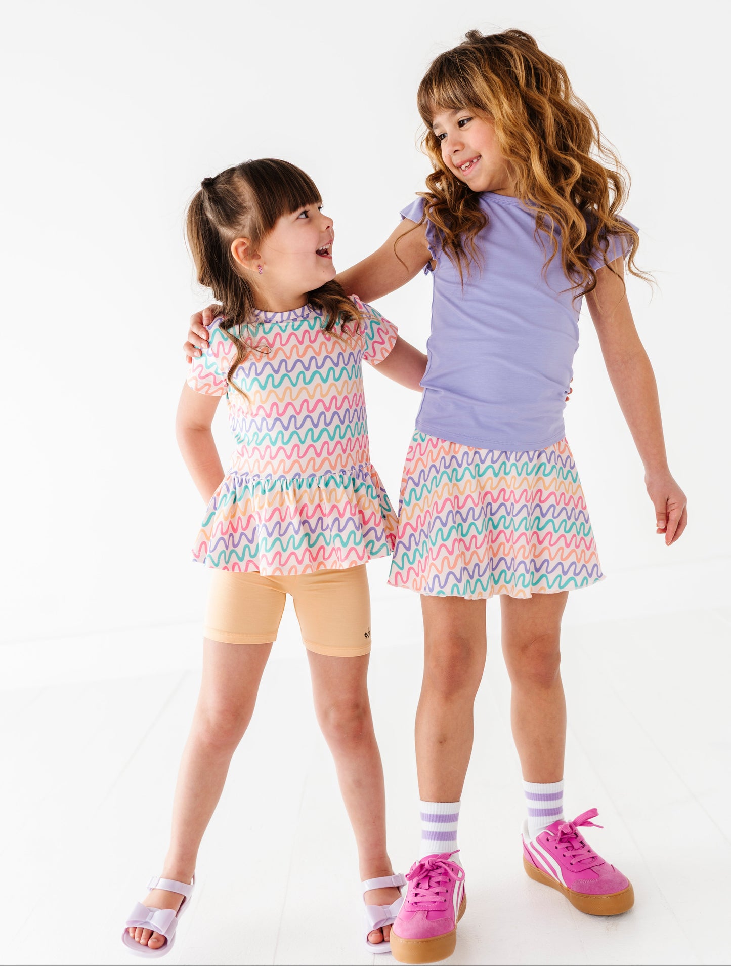 Two young girls wearing bamboo daywear outfits 