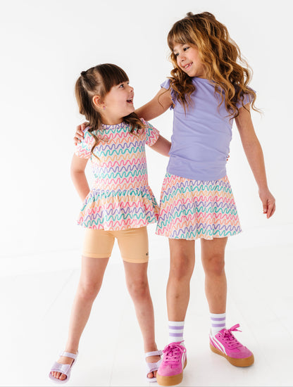 Two young girls wearing bamboo daywear outfits 