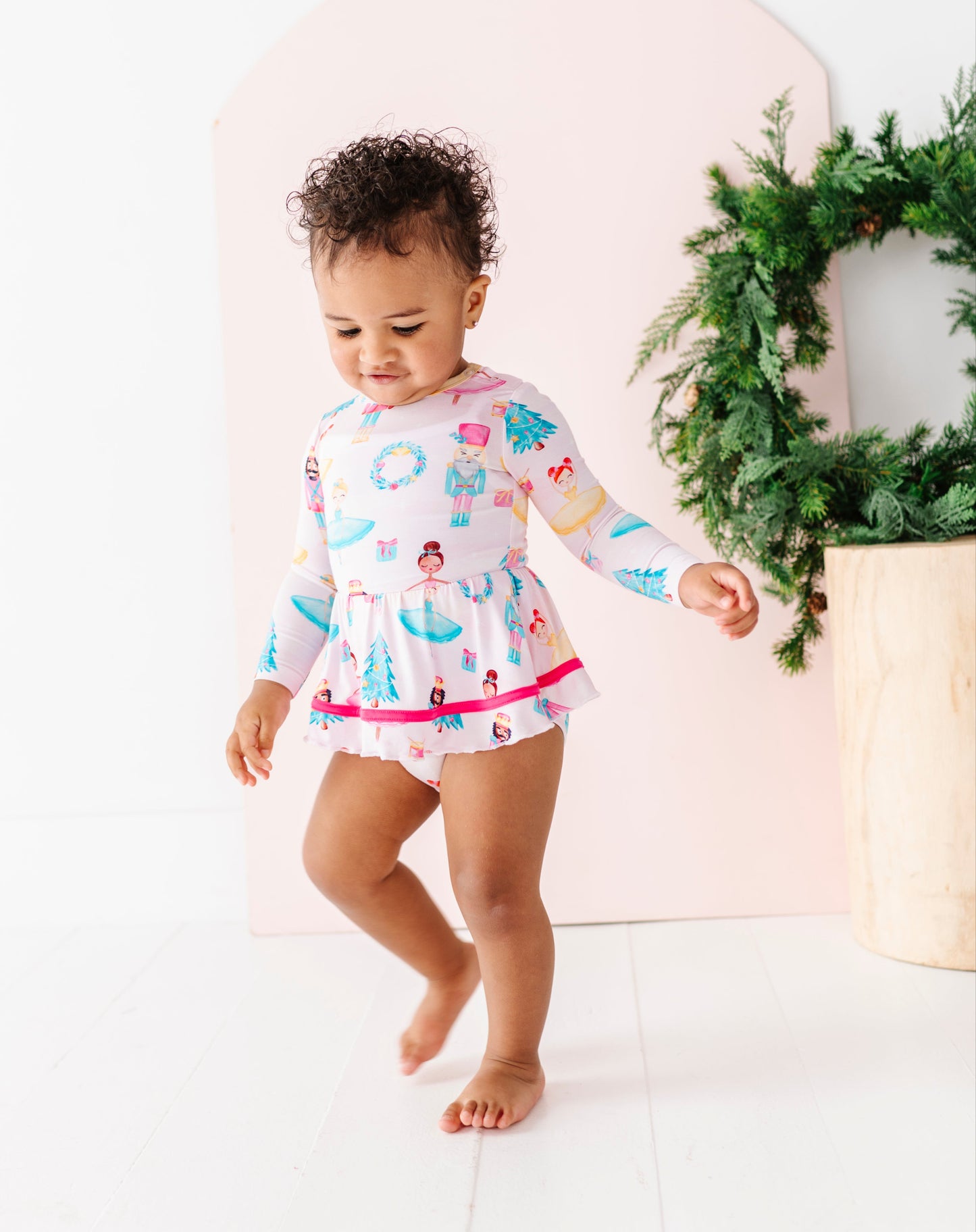 Infant holiday dress made from bamboo viscose with tiered twirl skirt