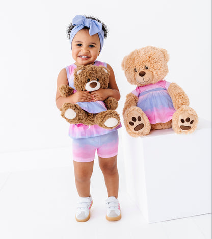 Little girl and her doll wearing matching bamboo ombre dresses