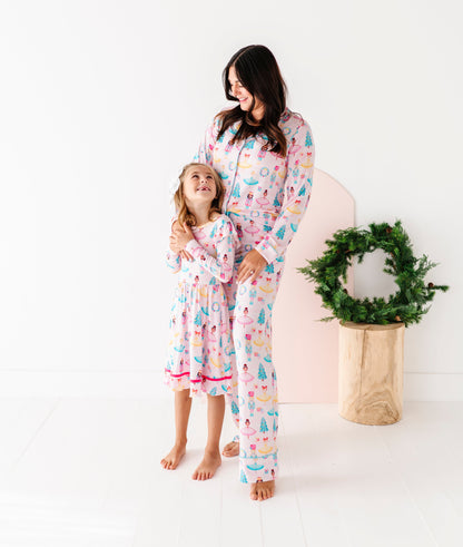Mom wearing nutcracker bamboo pajamas with daughter wearing bamboo twirl dress