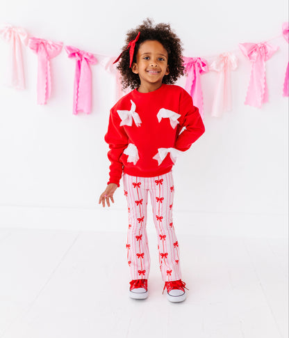 Soft bamboo cotton pants for kids with pink stripes and red bows