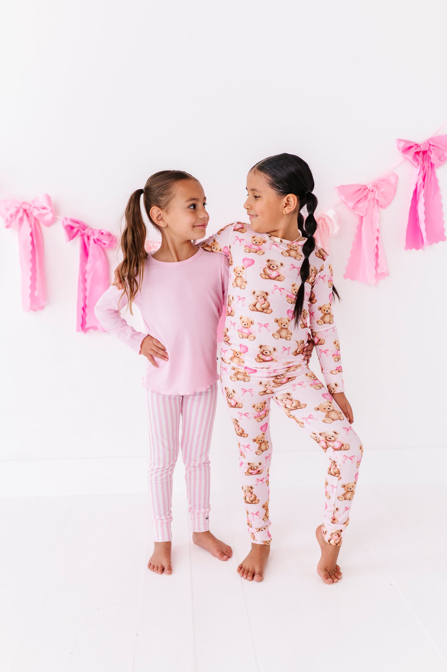 Full outfit view of Pink Beary Sweet bamboo pajamas for kids with snug ribbed fit