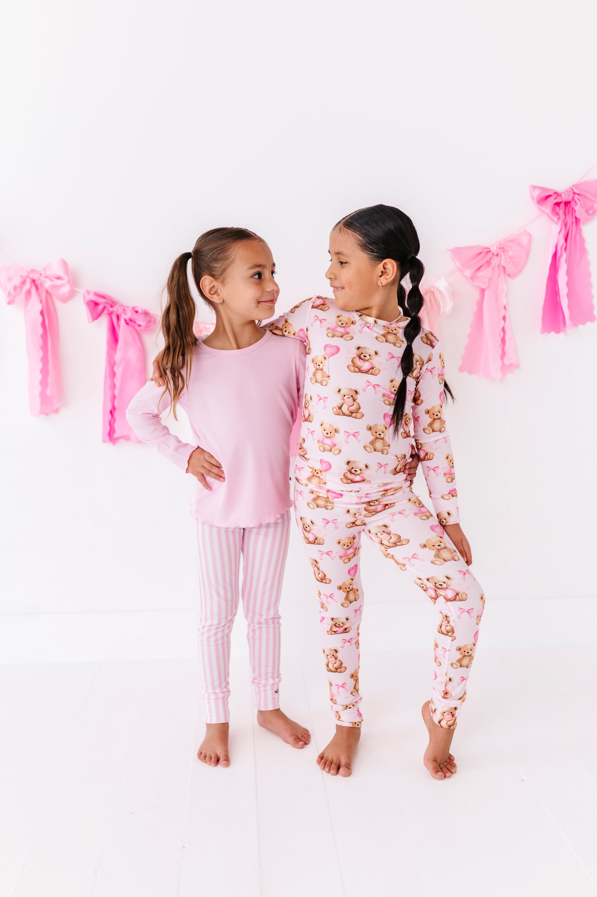 Full outfit view of Pink Beary Sweet bamboo pajamas for kids with snug ribbed fit