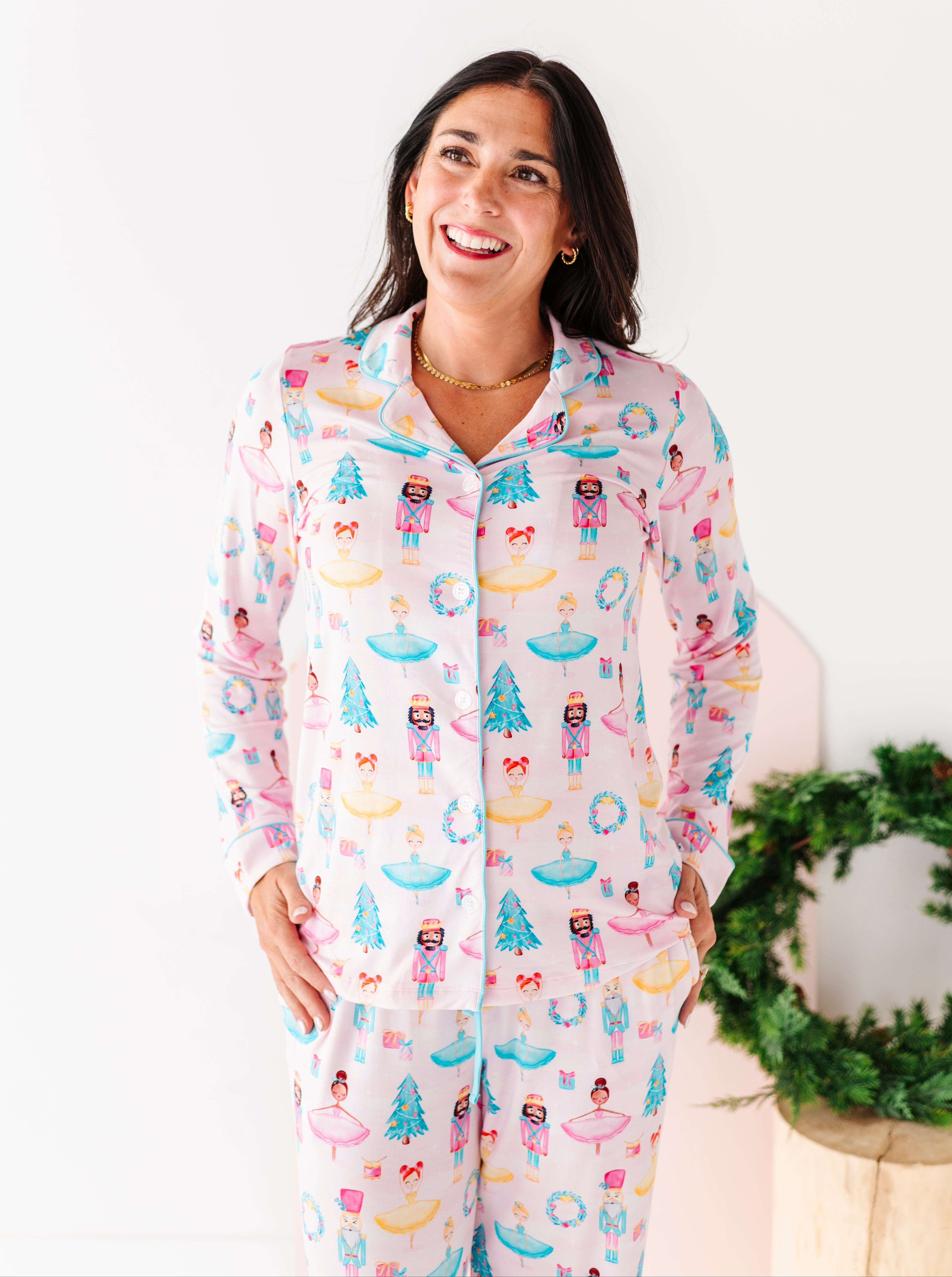 Woman wearing a colorful sugarplum bamboo pajama set 