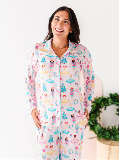 Woman wearing a colorful sugarplum bamboo pajama set 