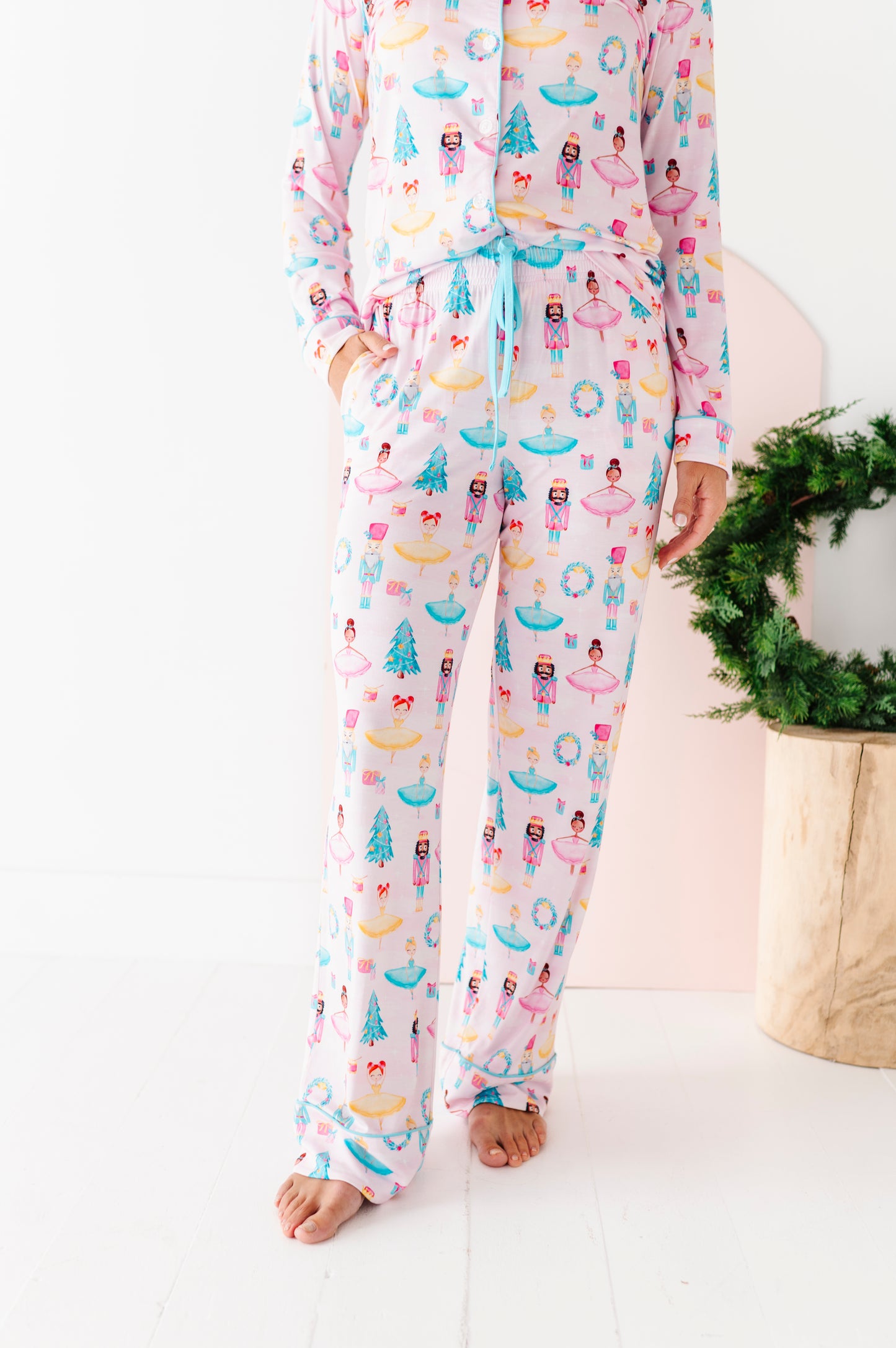 Mom wearing nutcracker and ballerina-themed bamboo pajama set