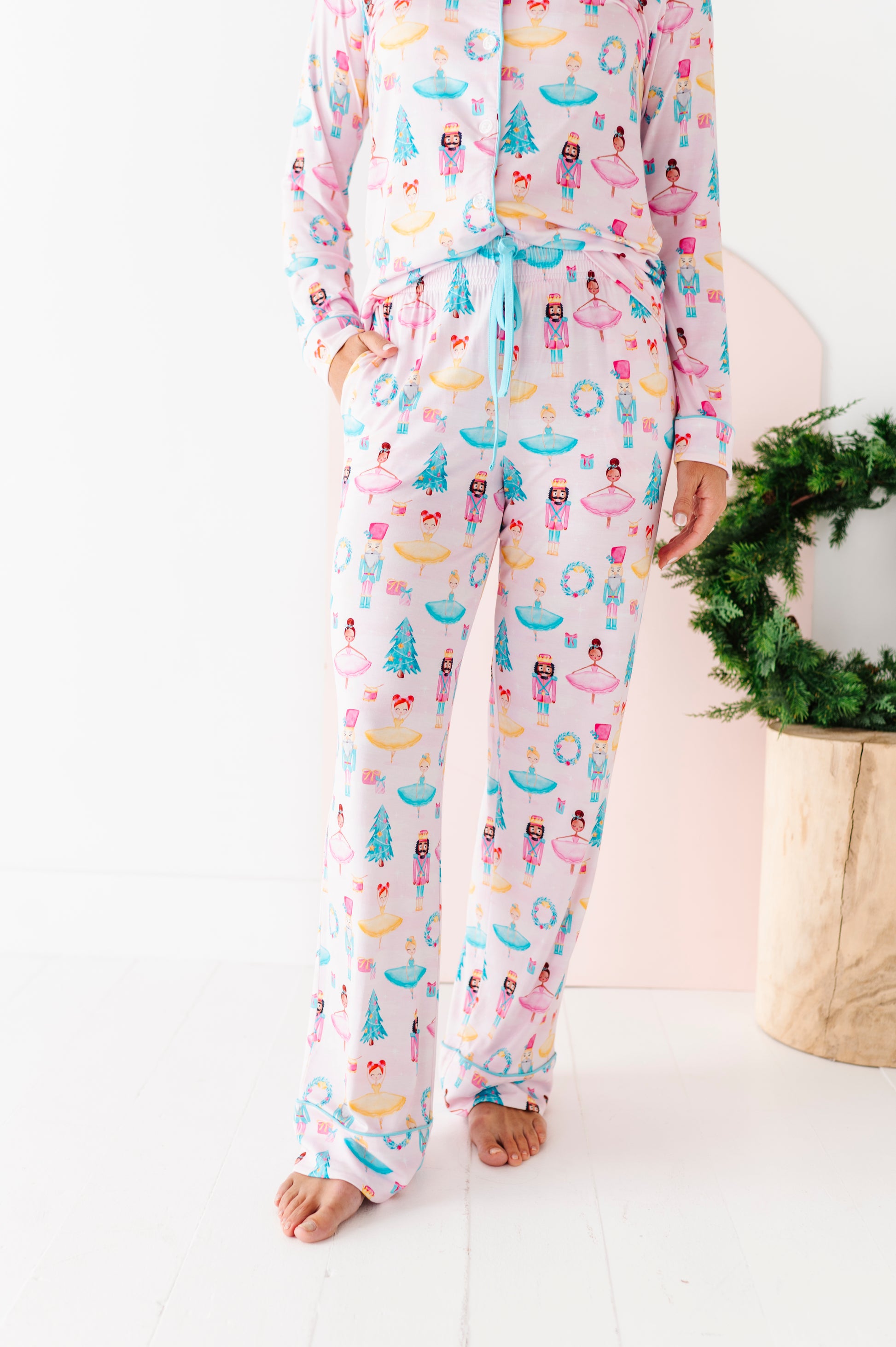 Mom wearing nutcracker and ballerina-themed bamboo pajama set