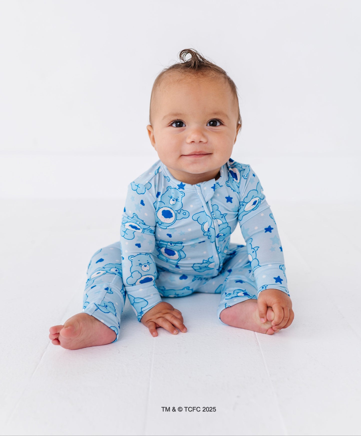 Convertible Grumpy Bear romper that transitions from footless romper to footed sleeper