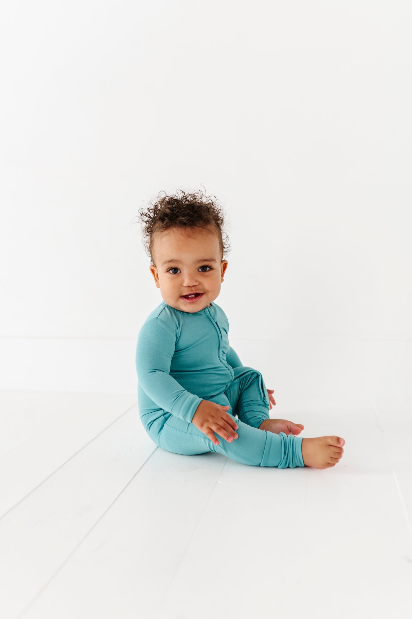 Bamboo baby romper designed for sleep and play in slate color