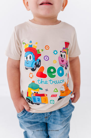 Close-up of a bamboo t-shirt with colorful Leo the Truck graphics and text on a white background